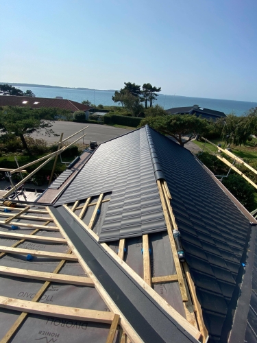 Tagrenovering i Næstved med professionel reparation, udskiftning af tagsten og energioptimering